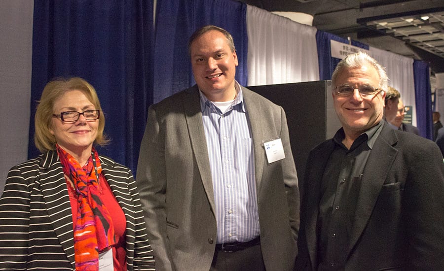 Ann Beheler, Matt Glover and Bill Saichek at CTC booth
