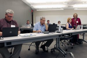 Employers (members of the Business and Industry Leadership Team - BILT) meet in a Collin College classroom to discuss IT workforce trends.