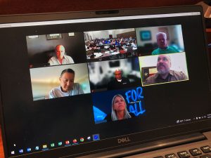 Laptop screen showing six employer members of the National CTC's BILT (Business and Industry Leadership Team) pparticipating in a Zoom panel for faculty and administrator attendees at the BILT Summit workshop.