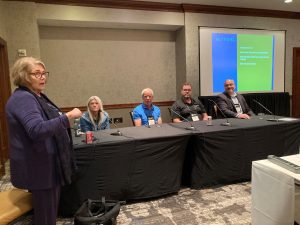Ann Beheler moderates a panel of educators and employers at the HITEC conference in Atlanta.