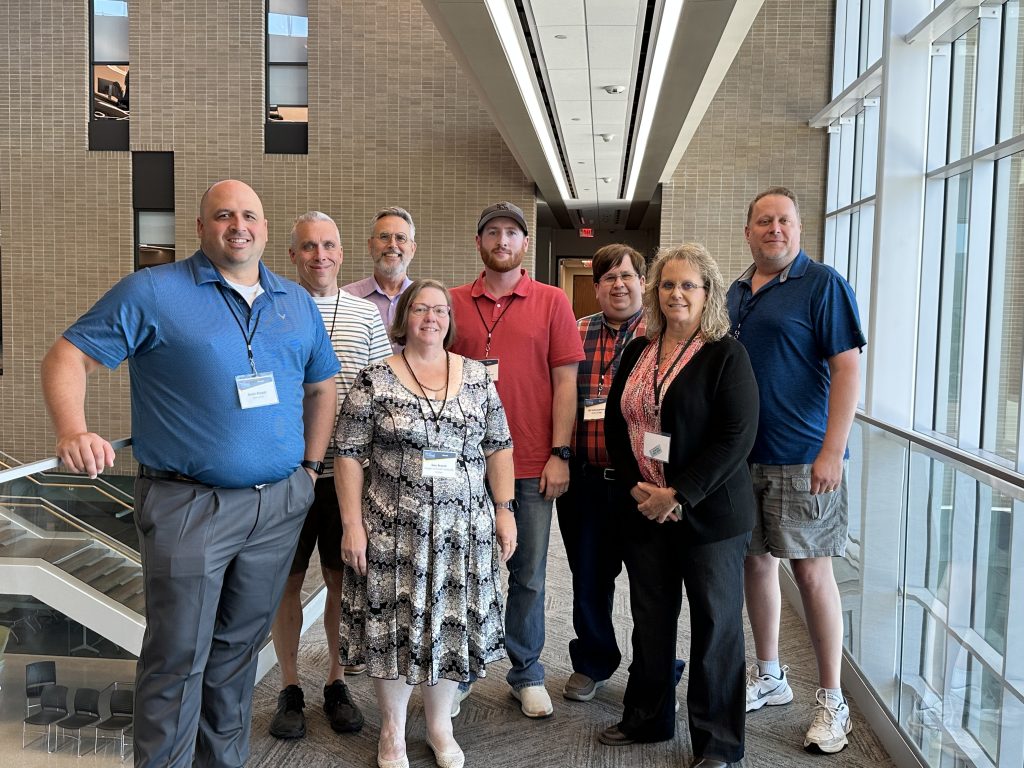 Attendees in the Azure track at Summer Working Connections pose in the IT Center mezzanine for a group photo.