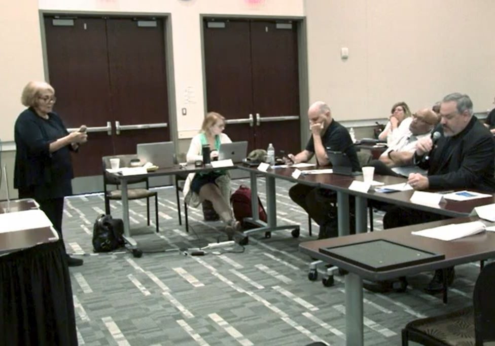Screen capture of the "BILT Spotlight" video showing Ann Beheler lead a BILT discussion with employers in a Collin College conference room.